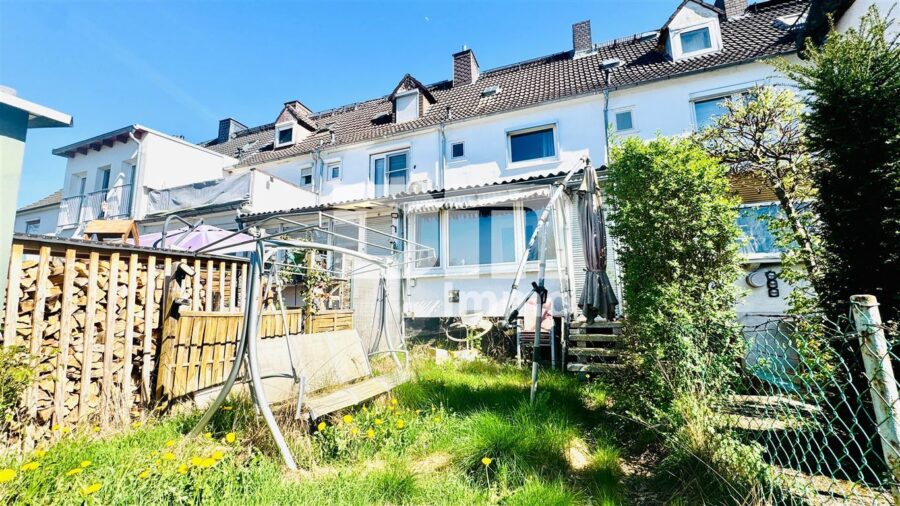 (R)eserviert! Kompaktes Reihenhaus in exponierter Lage mit Garten - Rückansicht / Gartenbereich